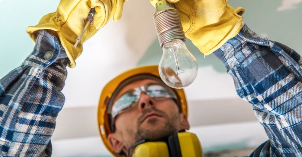 electrician checking cables in a lighting system t y4jekzq 1 1.jpg